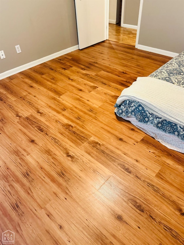 2804 Ivy Dr, Newport, AR 72112 - bedroom featuring wood finished floors and baseboards
