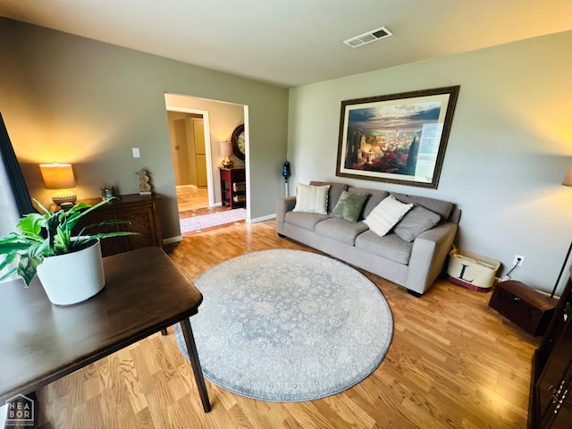 2804 Ivy Dr, Newport, AR 72112 - living room featuring wood finished floors and baseboards