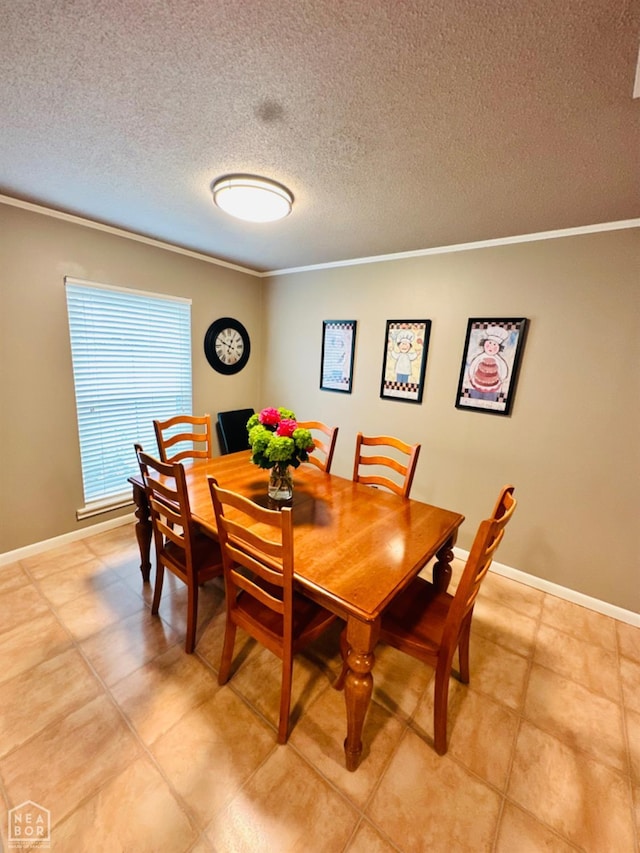 2804 Ivy Dr, Newport, AR 72112 - dining area with ornamental molding, baseboards, and a textured ceiling