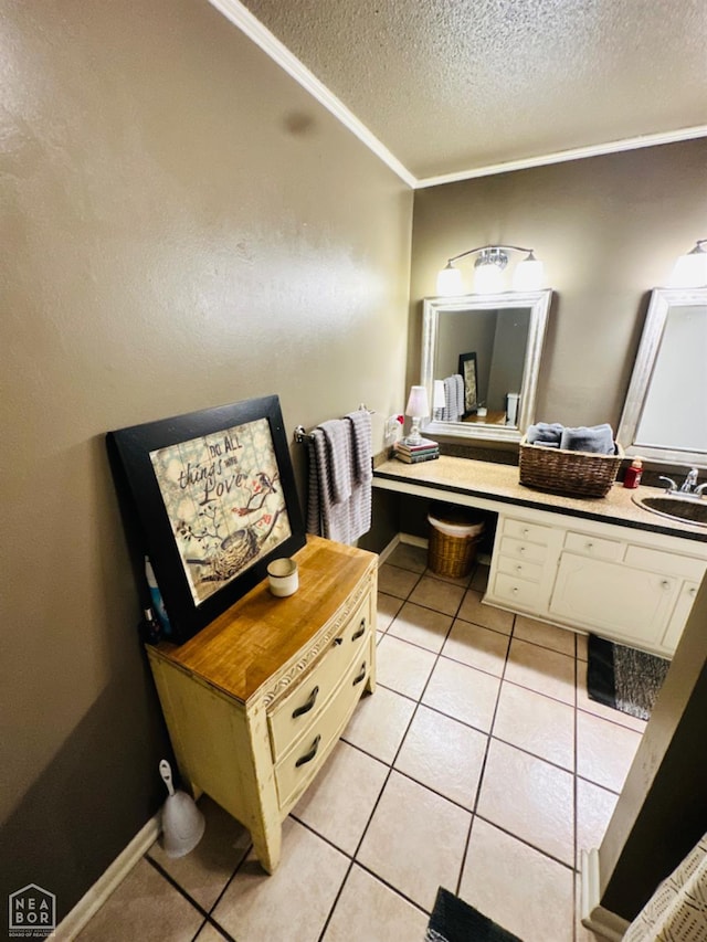2804 Ivy Dr, Newport, AR 72112 - bathroom featuring crown molding, a textured ceiling, tile patterned floors, and vanity