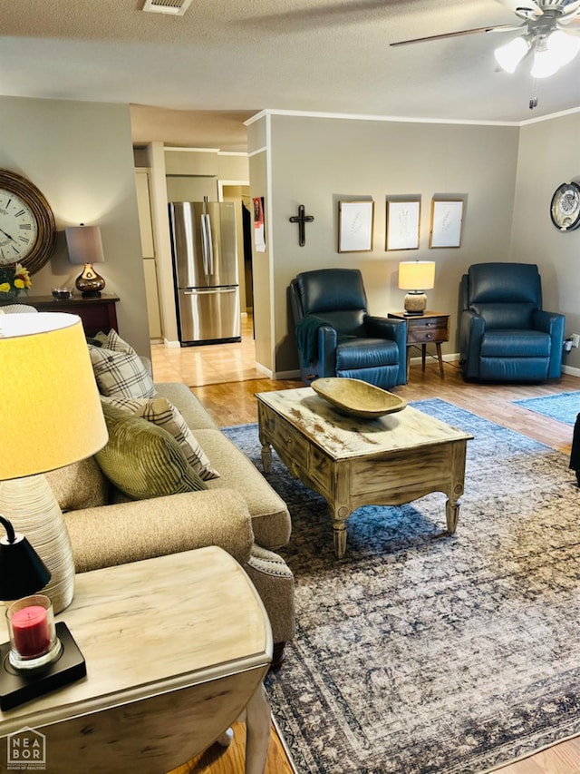2804 Ivy Dr, Newport, AR 72112 - living room with light wood-style flooring, ceiling fan, and baseboards