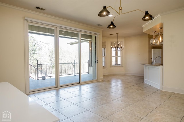 interior space featuring a notable chandelier, visible vents, crown molding, and light tile patterned flooring