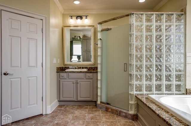 full bath with ornamental molding, a shower stall, vanity, tile patterned flooring, and a garden tub