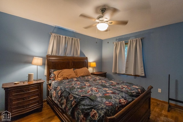 18020 Butterfly Rd, Harrisburg, AR 72432 - bedroom with wood finished floors and ceiling fan