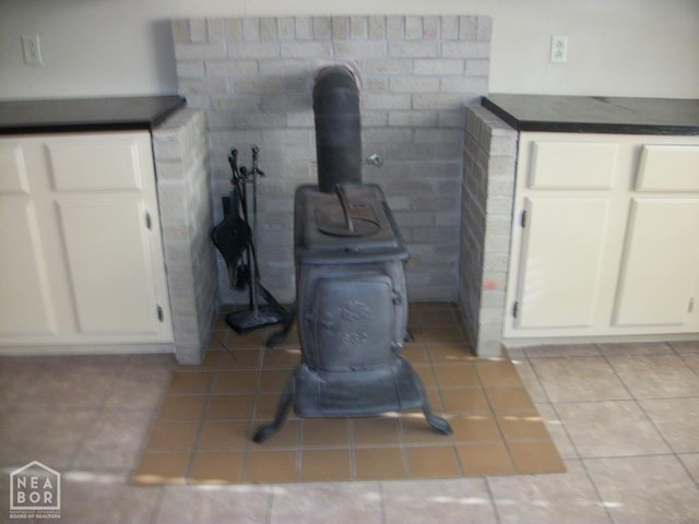room details featuring a wood stove