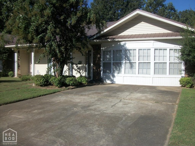 view of front of house featuring metal roof