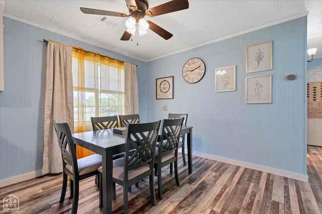 208 S Rockingchair Rd, Paragould, AR 72450 - dining area featuring ornamental molding, wood finished floors, baseboards, and ceiling fan