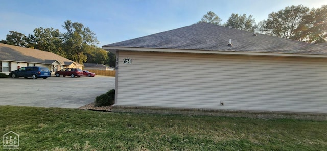 18 Brookland St, Brookland, AR 72417 - view of side of home with a shingled roof
