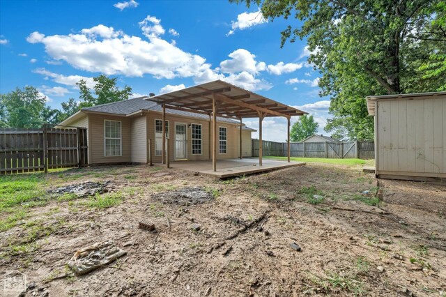 1104 Sandino Dr, Jonesboro, AR 72405 - back of house featuring a patio area and a fenced backyard