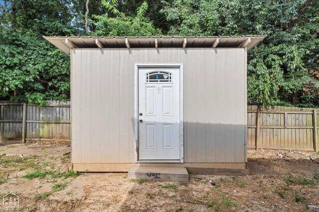 1104 Sandino Dr, Jonesboro, AR 72405 - view of shed with a fenced backyard
