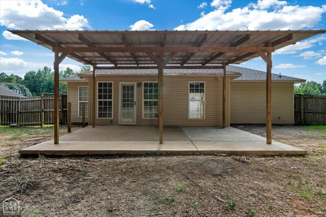 1104 Sandino Dr, Jonesboro, AR 72405 - back of house with roof with shingles