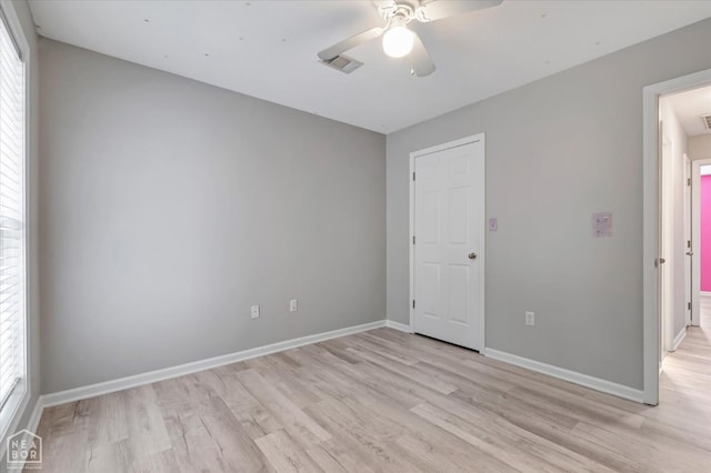1104 Sandino Dr, Jonesboro, AR 72405 - unfurnished bedroom featuring light wood finished floors and ceiling fan