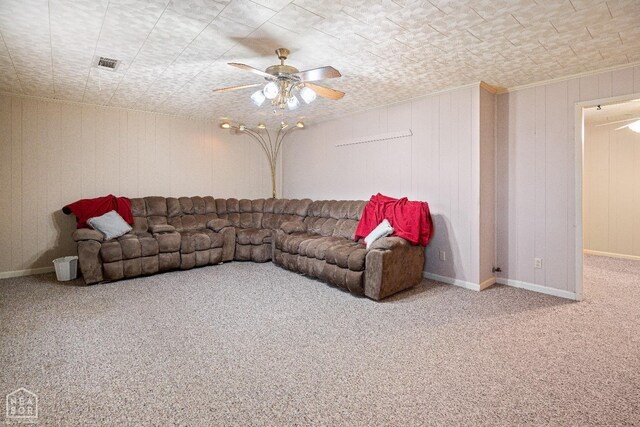 1303 Magnolia Ave, Walnut Ridge, AR 72476 - living room featuring carpet flooring, baseboards, visible vents, a ceiling fan, and crown molding