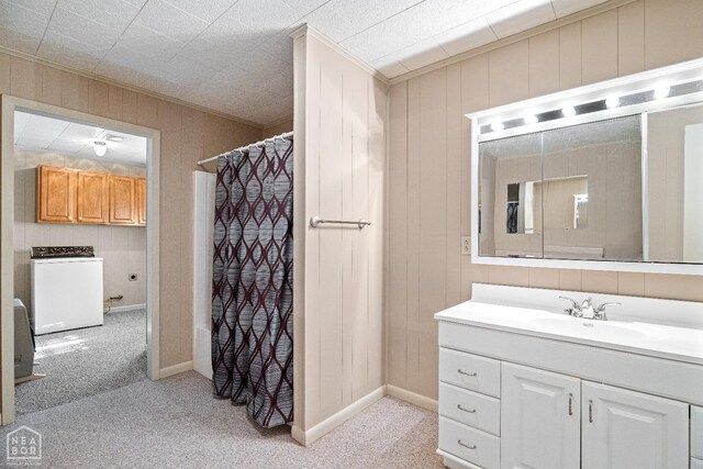 1303 Magnolia Ave, Walnut Ridge, AR 72476 - full bathroom with crown molding, vanity, baseboards, washer / clothes dryer, and a shower with shower curtain