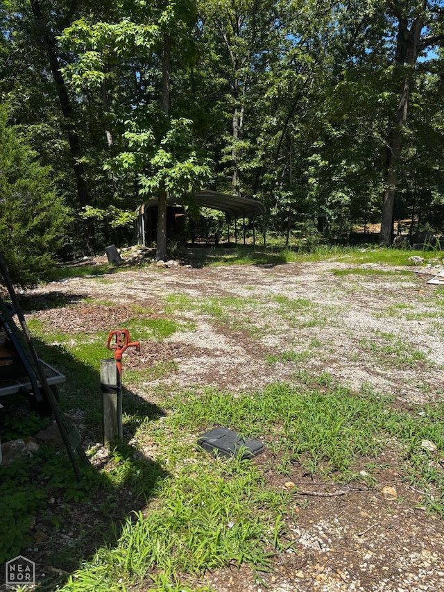 48 E Lakeshore Dr, Williford, AR 72482 - view of yard featuring a carport