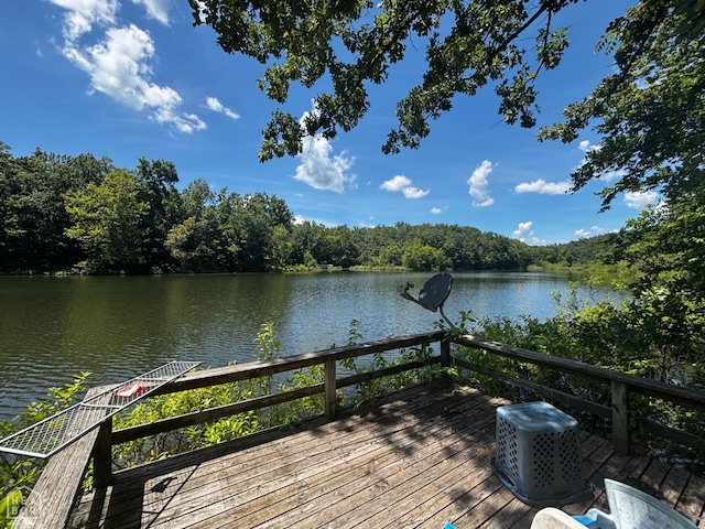 48 E Lakeshore Dr, Williford, AR 72482 - dock with a water view and a wooded view