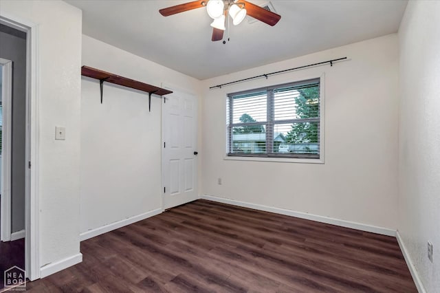 2504 SE 2nd St SE, Hoxie, AR 72433 - unfurnished bedroom with wood finished floors, baseboards, and ceiling fan