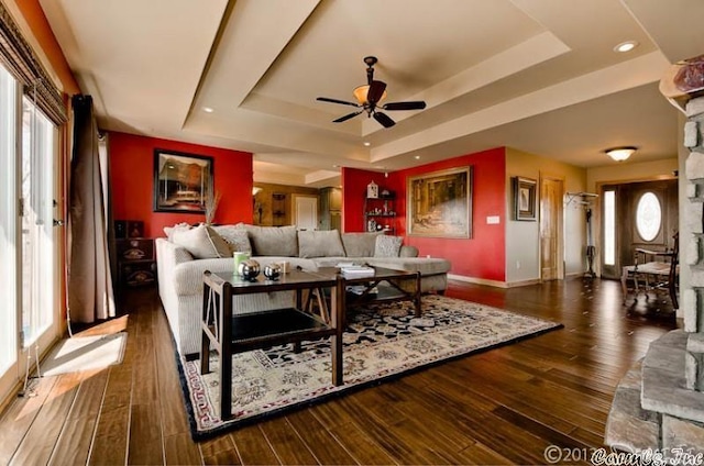69 Jackson Rdg, Eureka Springs, AR 72631 - living room featuring a raised ceiling, ceiling fan, and dark hardwood / wood-style flooring