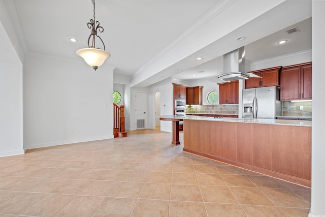 kitchen featuring stainless steel fridge, island exhaust hood, hanging light fixtures, light stone countertops, and tasteful backsplash