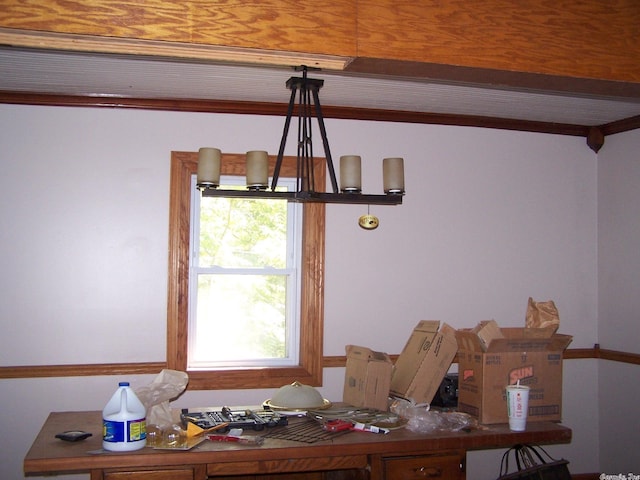 unfurnished dining area featuring a notable chandelier