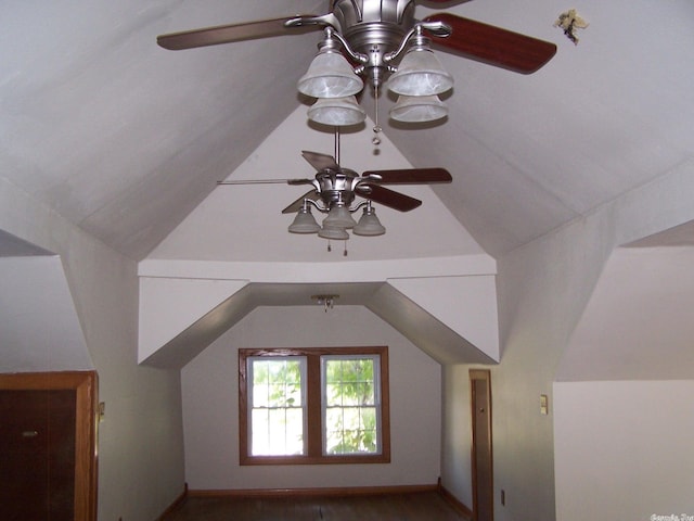 additional living space with ceiling fan and vaulted ceiling