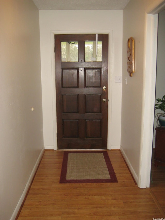 foyer featuring hardwood / wood-style flooring