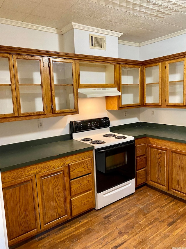 kitchen with range with electric cooktop, dark hardwood / wood-style floors, and ornamental molding