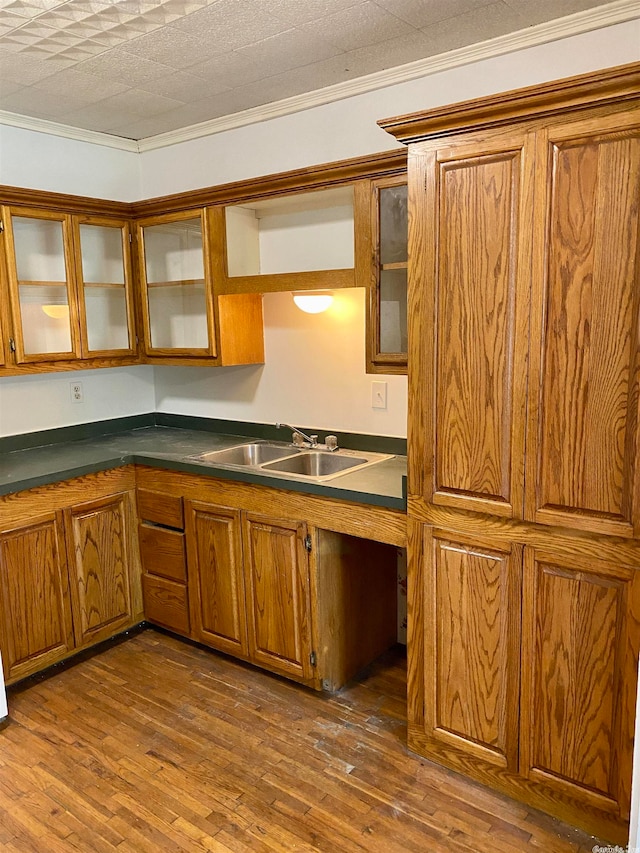 kitchen featuring dark hardwood / wood-style flooring and sink