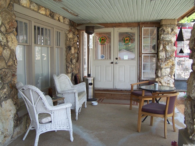 sunroom with wood ceiling