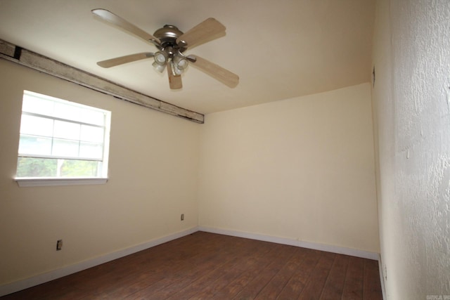 unfurnished room with ceiling fan and dark hardwood / wood-style floors