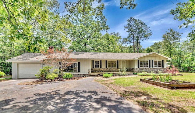 single story home with a garage