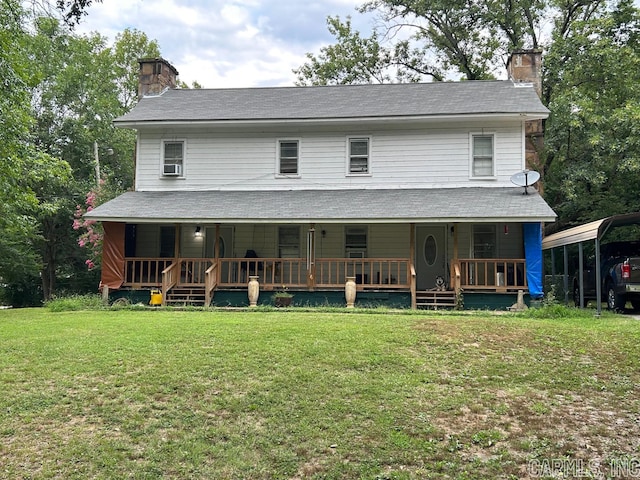 view of front of home featuring a porch, a chimney, and a front lawn