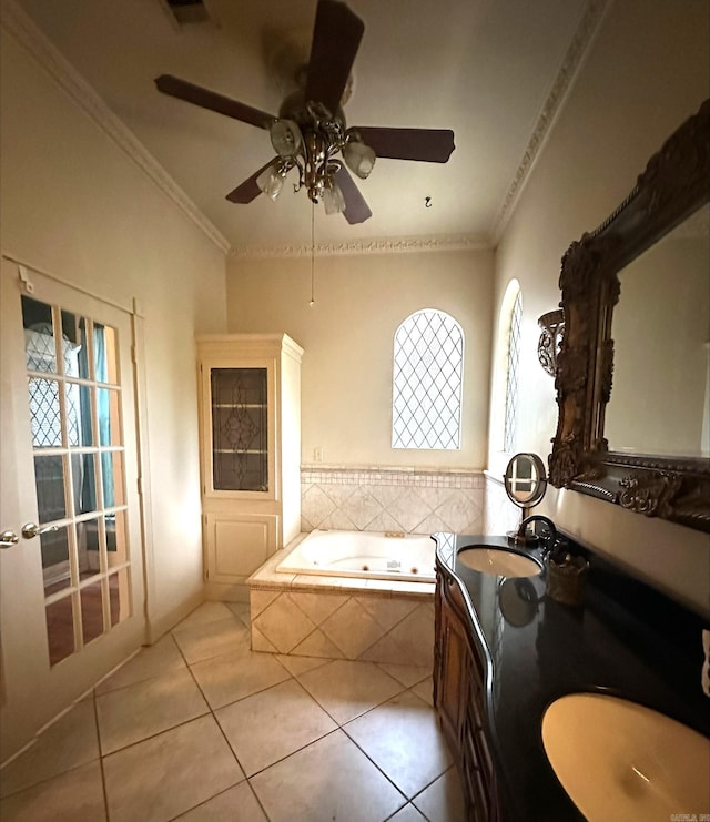 bathroom featuring tile floors, crown molding, ceiling fan, and tiled bath