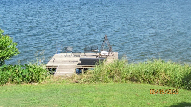 view of dock with a water view