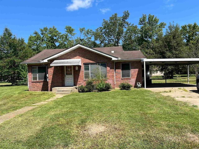 ranch-style house with a carport and a front lawn