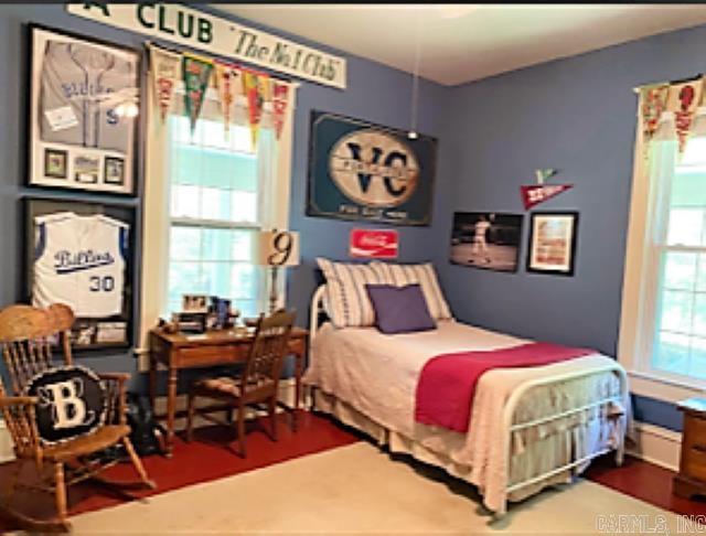 bedroom featuring dark wood-type flooring