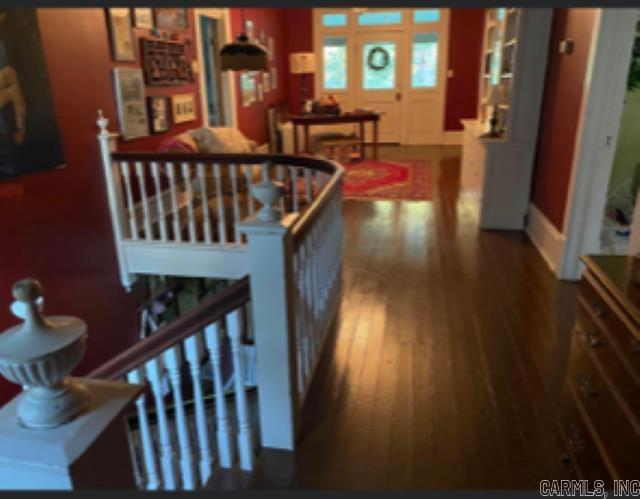 hall featuring dark hardwood / wood-style floors