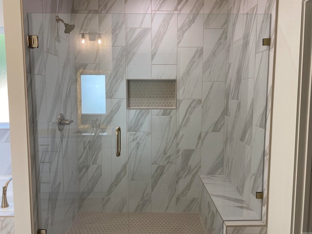 bathroom featuring an enclosed shower