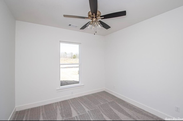 unfurnished room featuring carpet flooring and ceiling fan