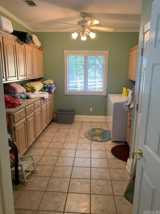 kitchen with crown molding, light brown cabinetry, light tile flooring, and ceiling fan