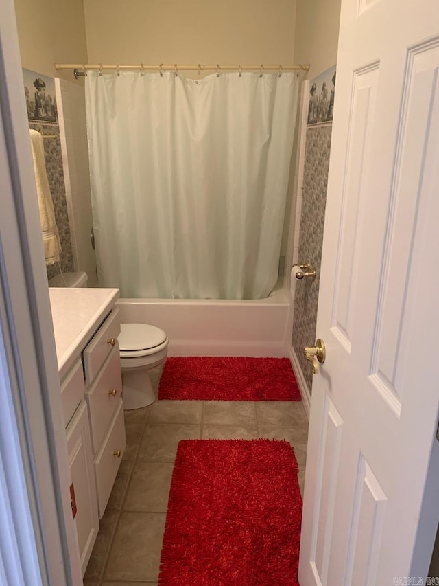 full bathroom with tile flooring, toilet, shower / bath combo, and vanity