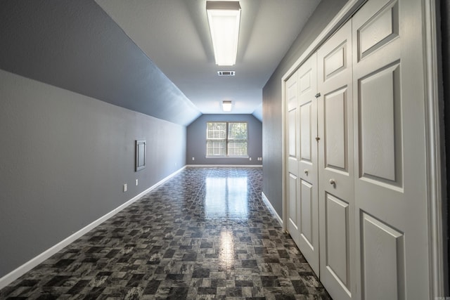 bonus room featuring lofted ceiling