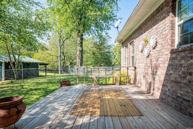 deck featuring a lawn