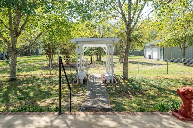 view of yard with an outdoor structure and a garage