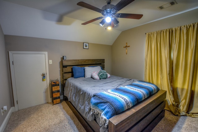 carpeted bedroom with ceiling fan and lofted ceiling