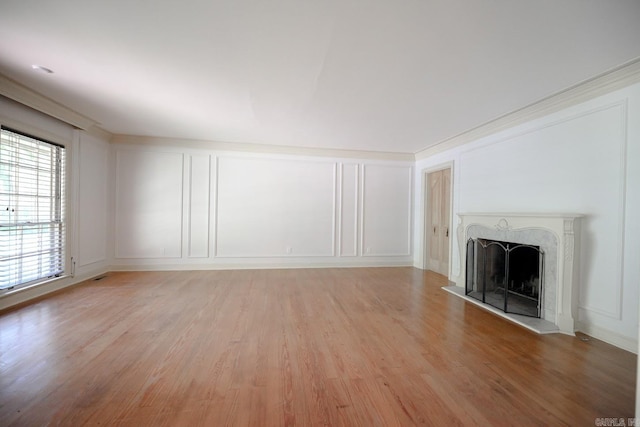 unfurnished living room featuring light hardwood / wood-style floors