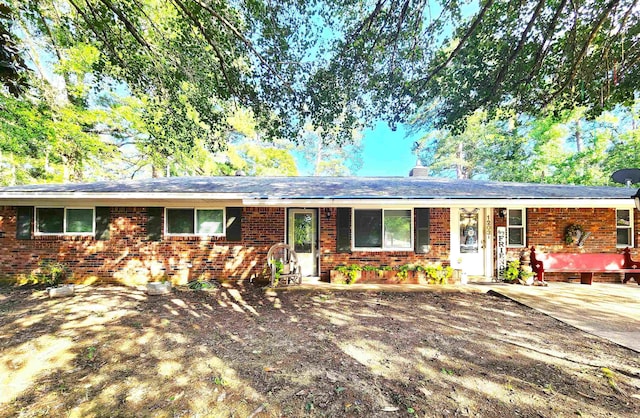 single story home featuring a patio