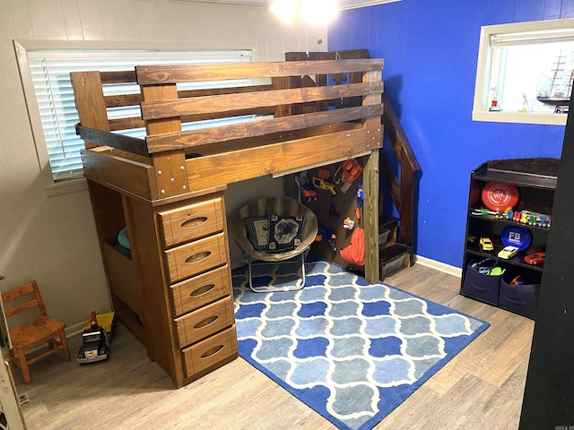 bedroom featuring light hardwood / wood-style floors