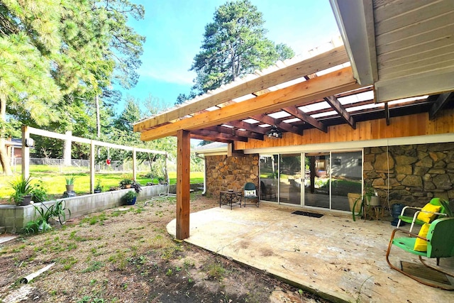 view of terrace featuring a pergola