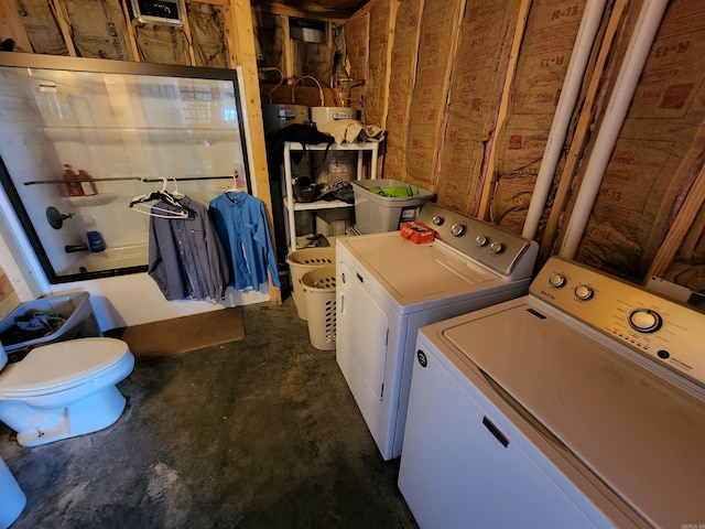 clothes washing area featuring separate washer and dryer